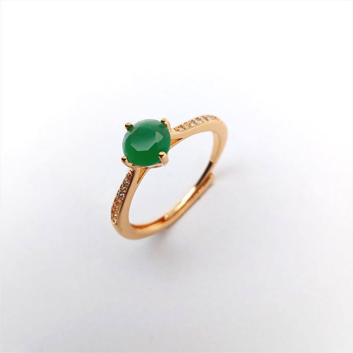 green solitaire ring